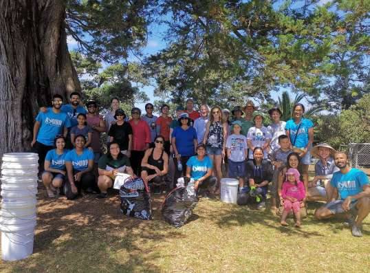 AYUDH youth group outdoors after a clean-up